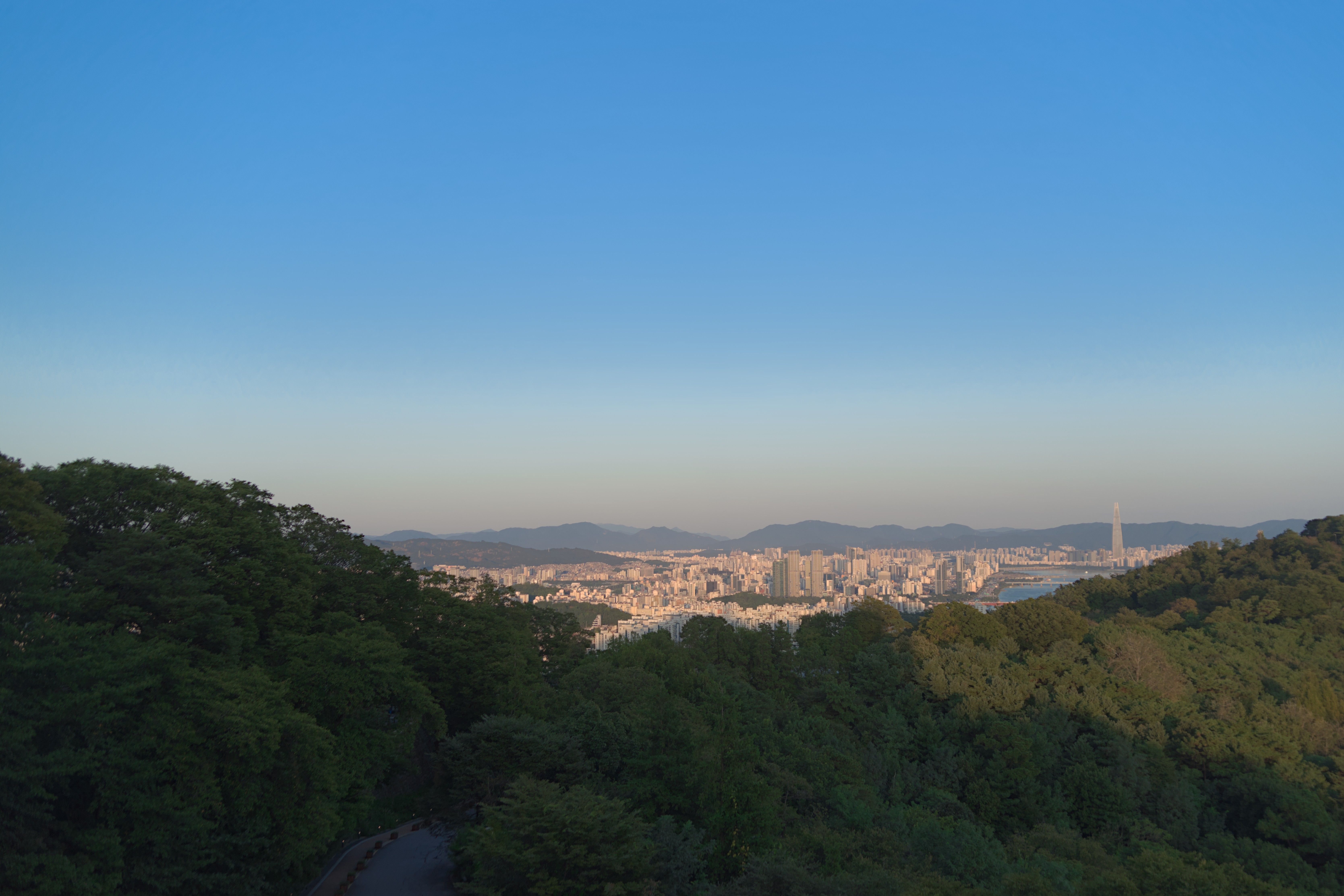 Gangnam with the Lotte Tower visible as seen from Namsan.